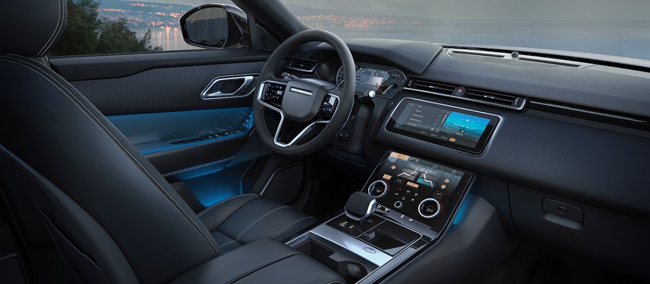 The Black Leather Interior of a Range Rover Velar”></div>
<div class=